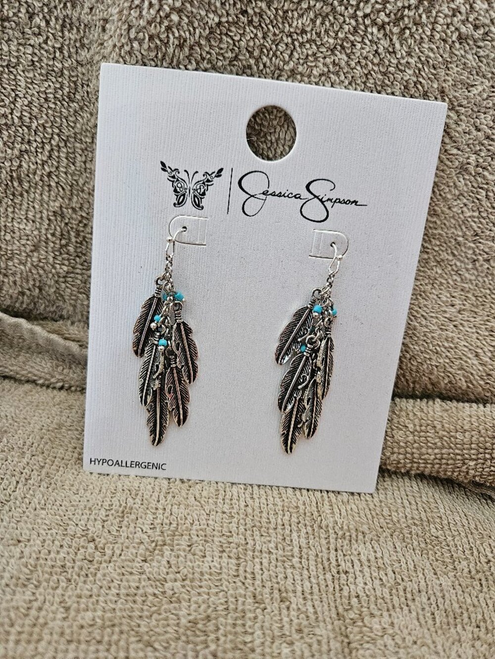 Jessica Simpson feather earrings